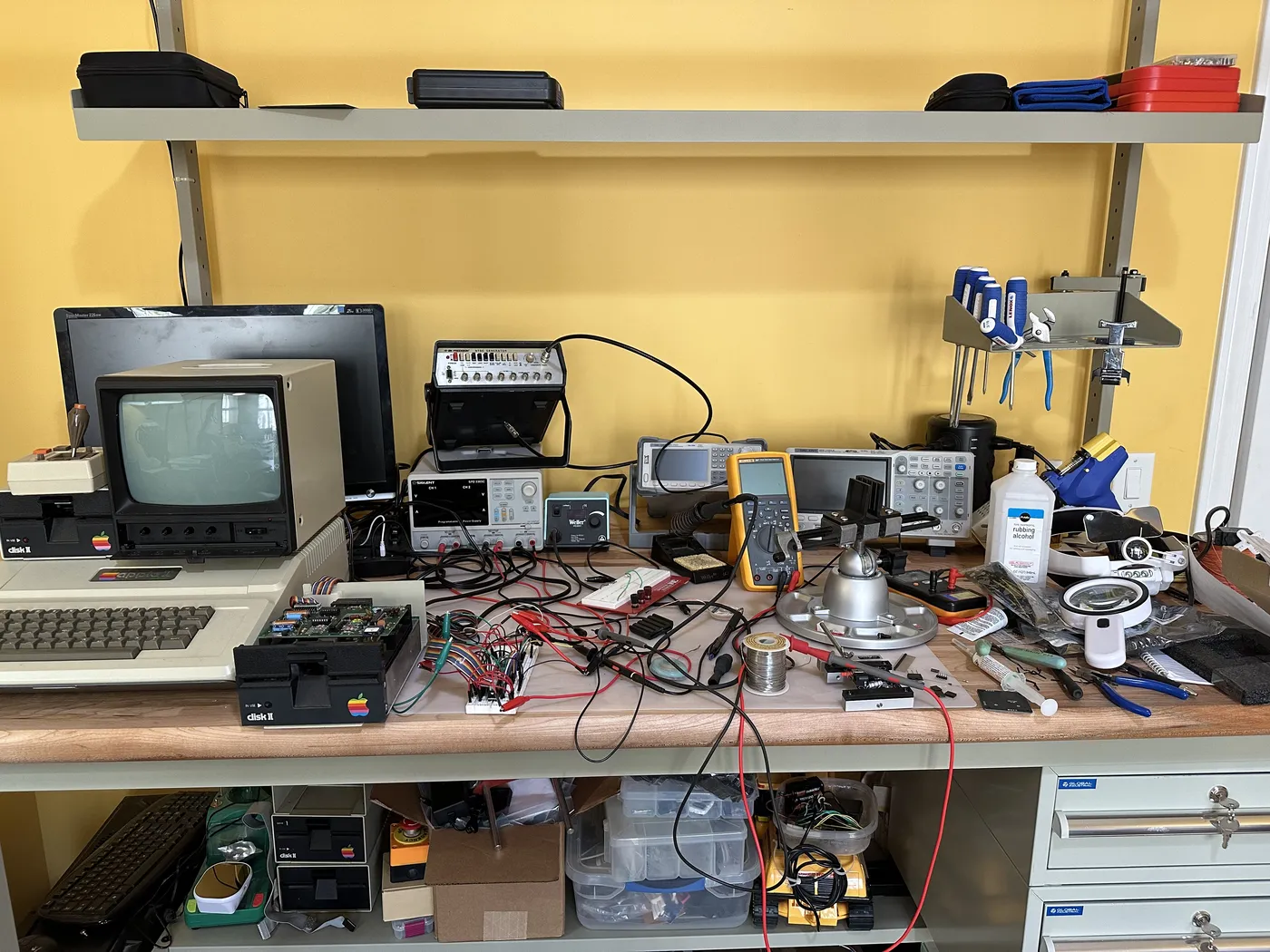 Hugh's workbench: an Apple II, oscilloscopes and a soldering station